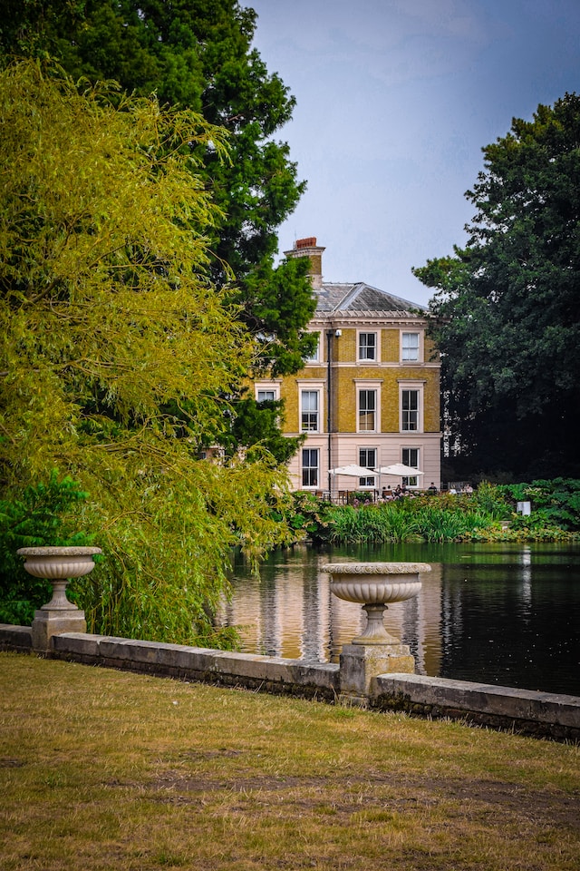 A picture of a large property next to a river in Kew, London